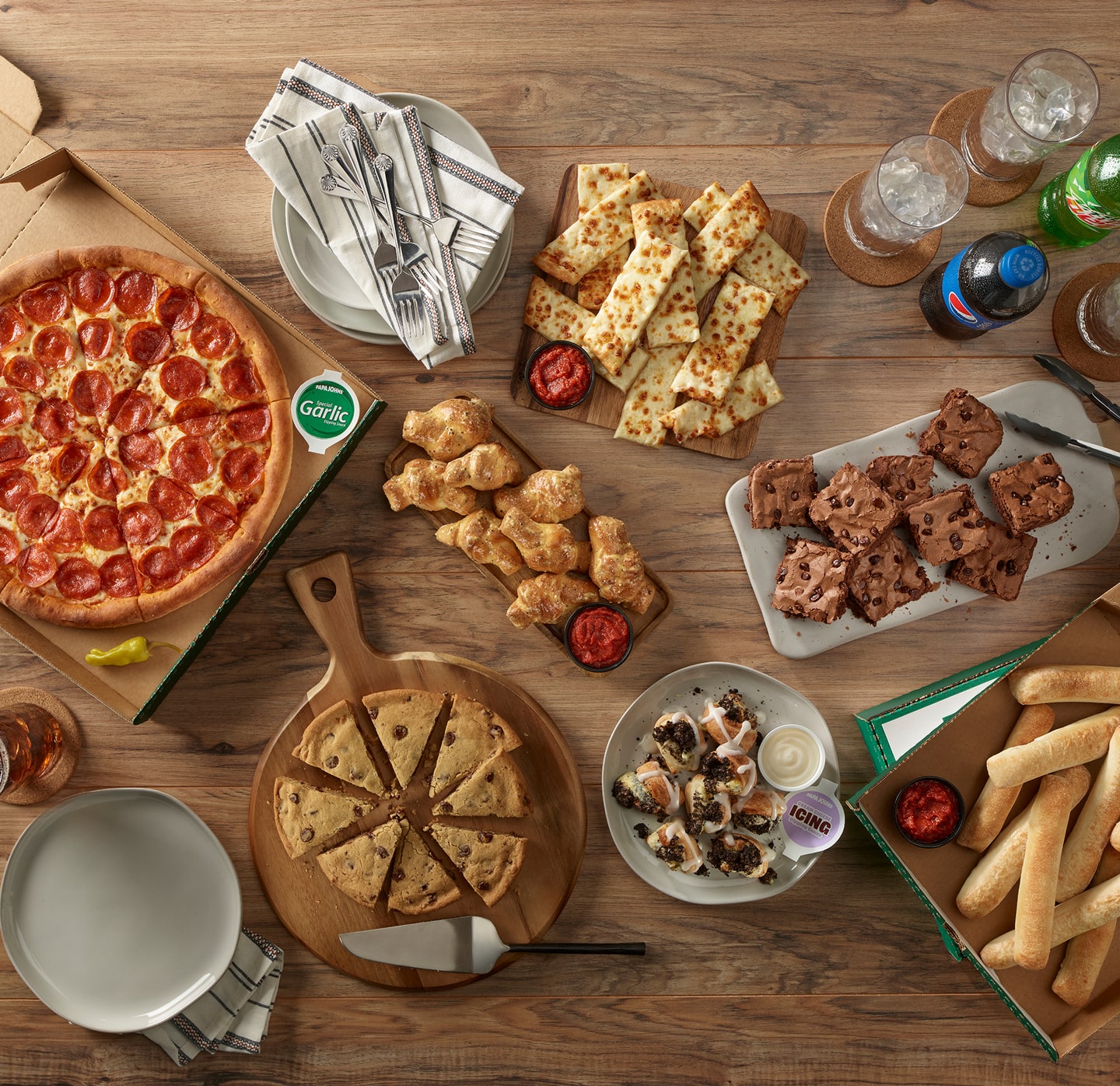 Papa Johns pizza ingredients and food spread