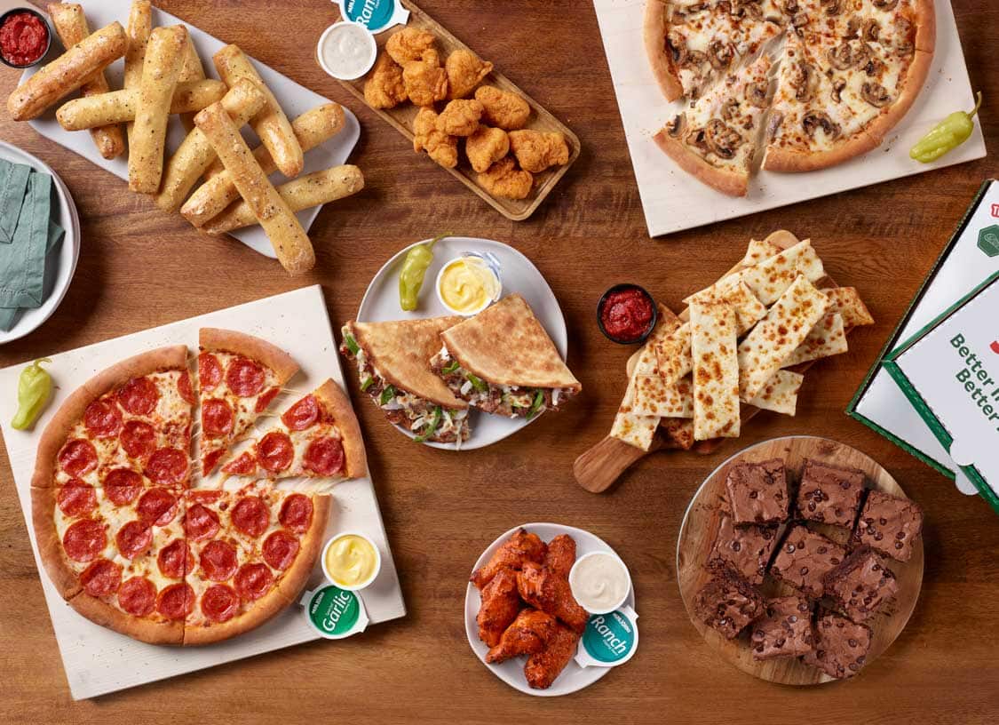 chicken poppers, 1-topping pizza, papadia, cheesesticks, hot lemon pepper wings and brownie