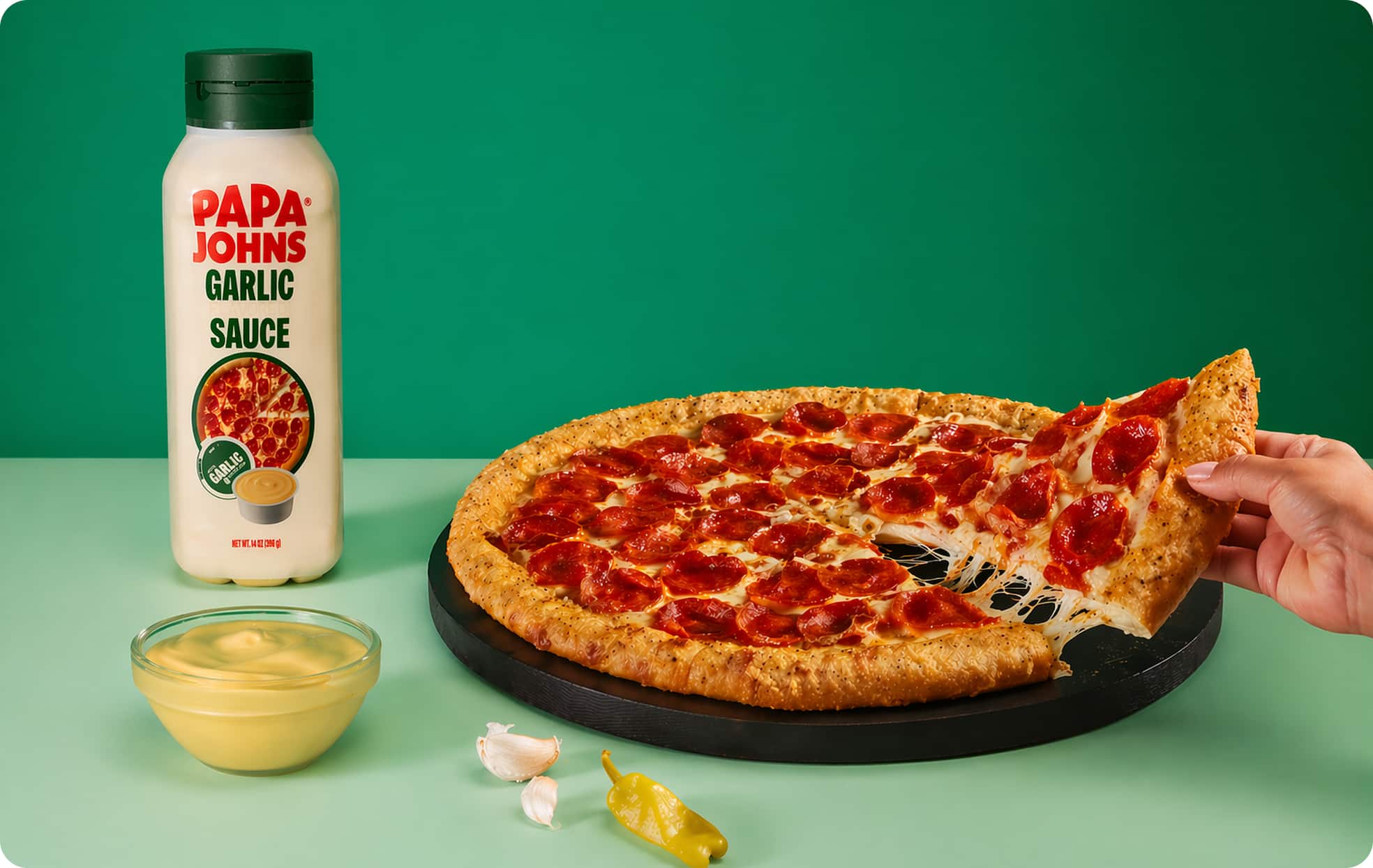 Papa Johns Garlic Flavored Sauce with pizza