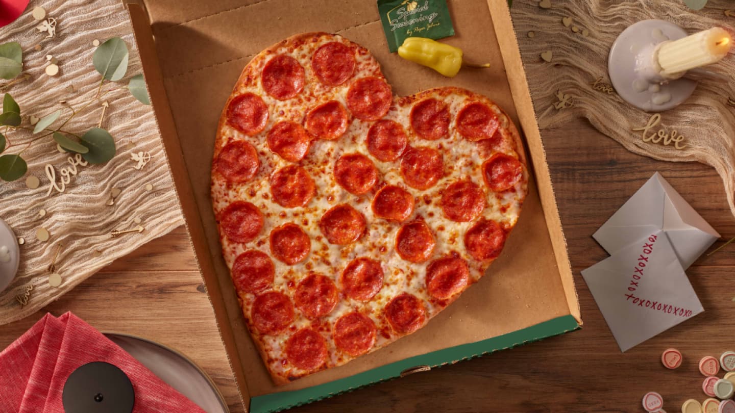 Papa Johns heart shaped pizza in pizza box