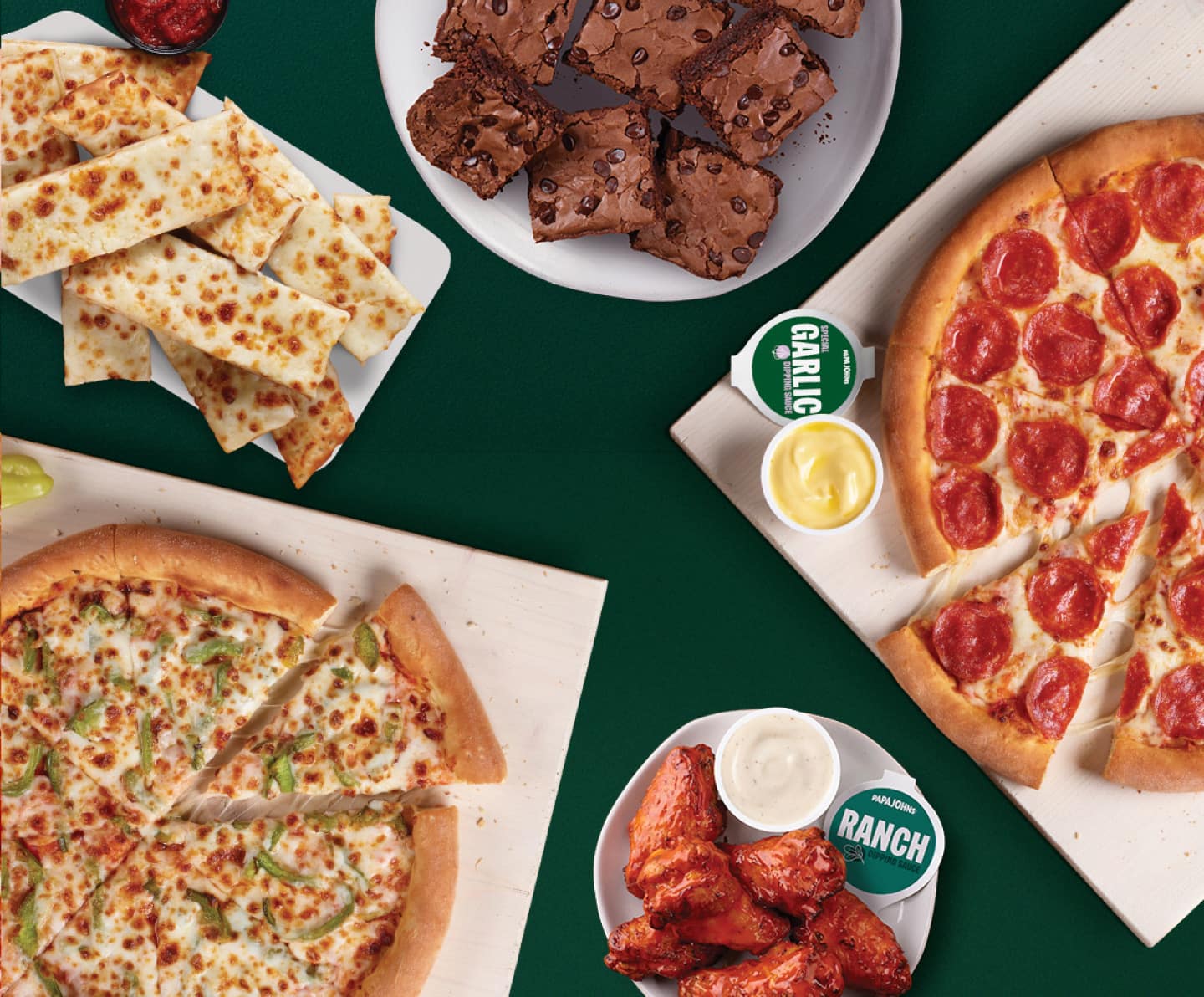Papa pairings with pizza, cheesesticks, chicken wings, breadsticks, brownies, and dipping sauces