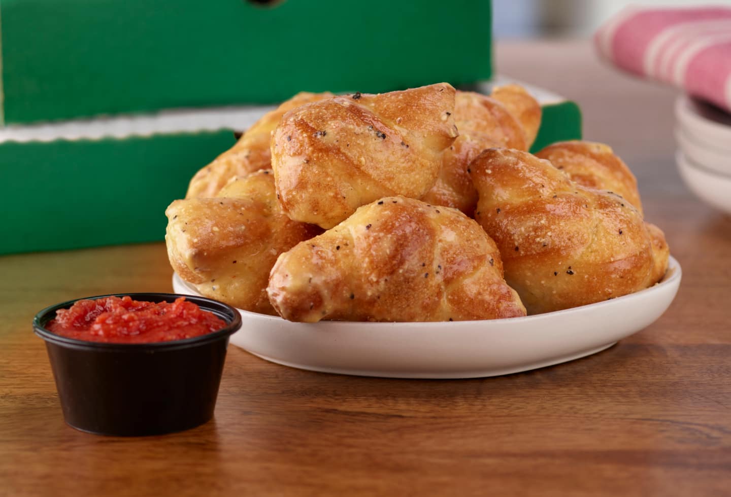 Pulling apart a Papa Johns Garlic Knot.