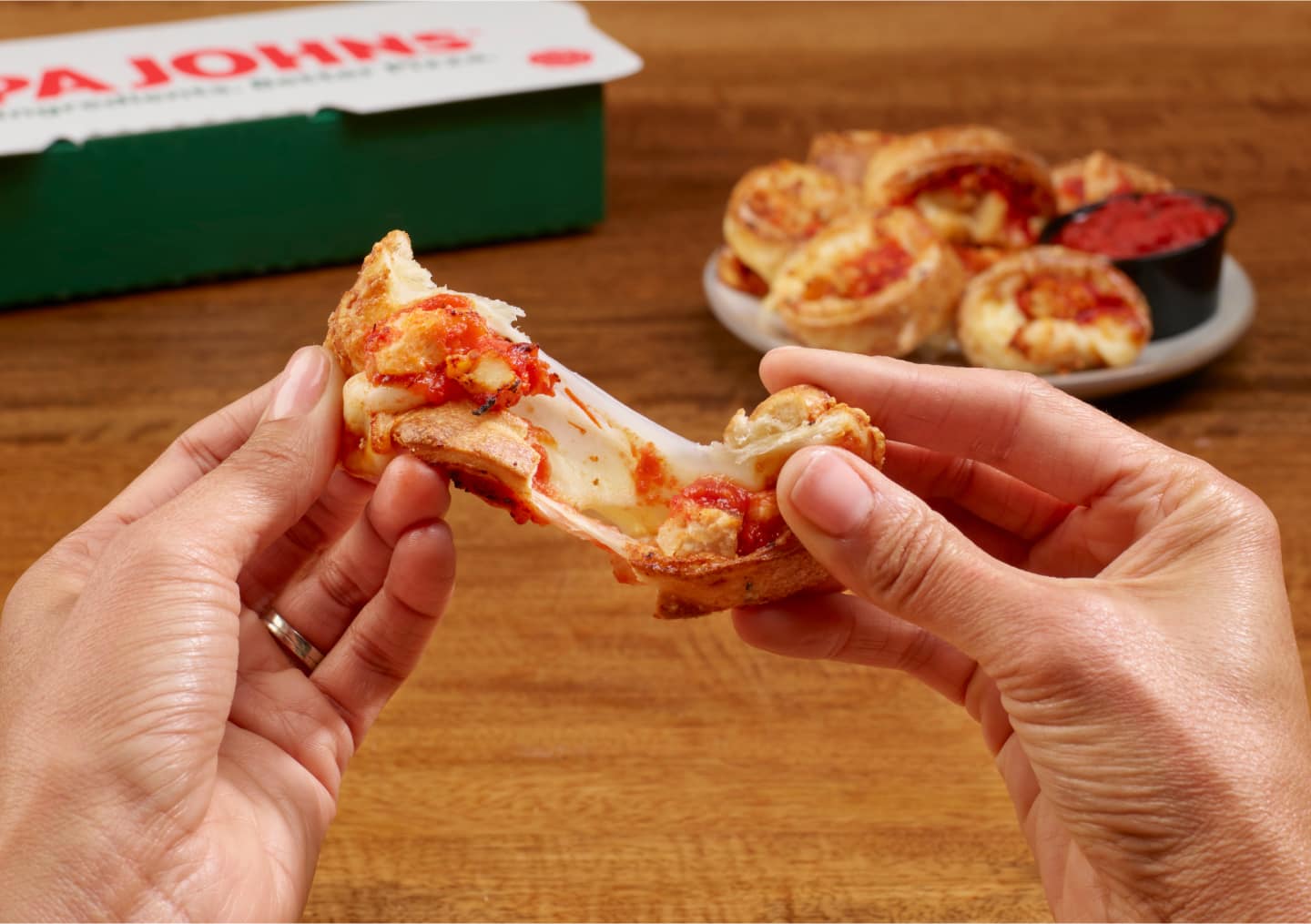 Pulling apart a Papa Johns Papa Bite.