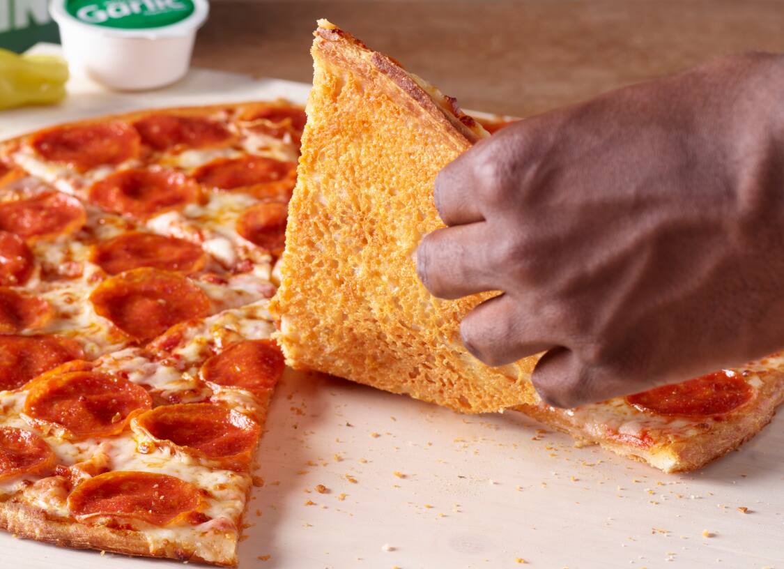 Try our NEW Crispy Parm Pizza